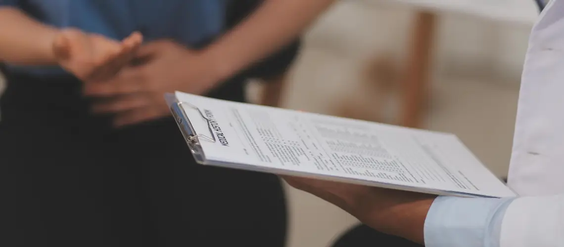 Doctor discussing medical cannabis pricing options with a patient